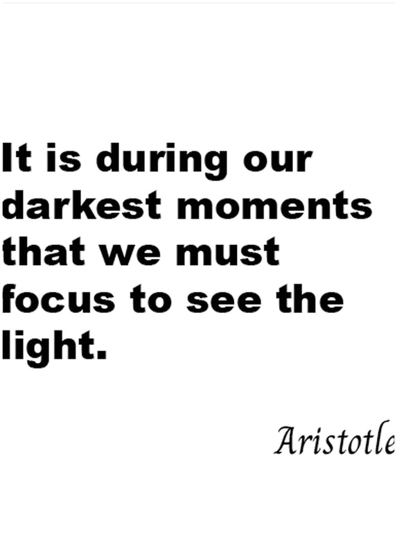 It Is During Our Darkest Moments That We Must Focus To See The Light Poster